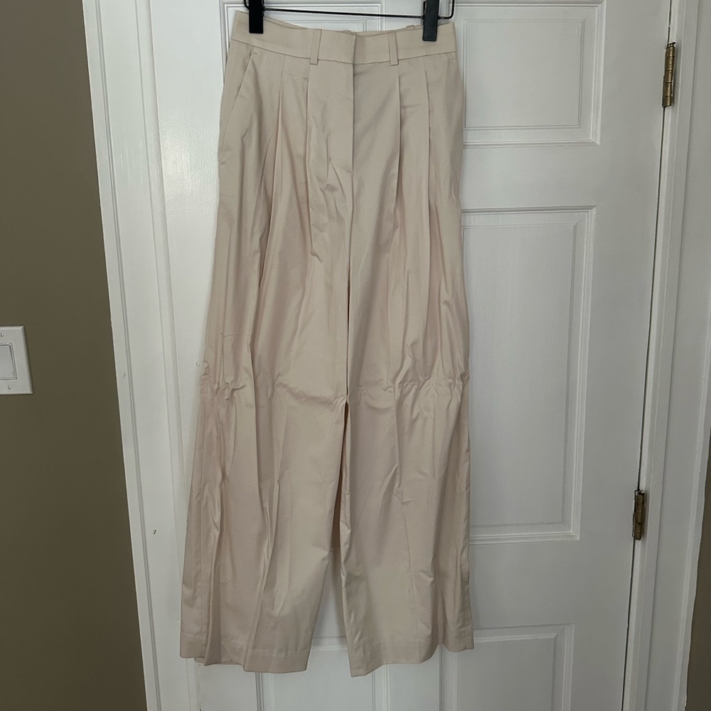 COS light beige wide leg trousers
Size 4
Brand new with tags
Never worn